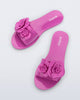Top view of a pair of pink Babe Petals slide sandals