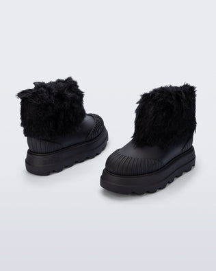 Back and angled view of a pair of black Warm Boot with fuzzy cuff and insole