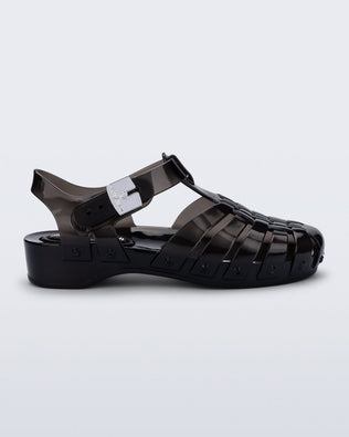 Side view of a black Possession Pescura + Scholl fisherman sandal with white bottom sole