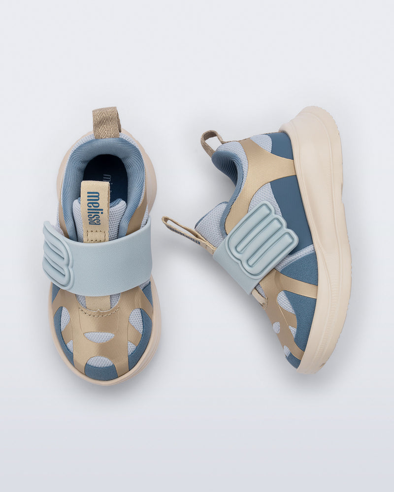 Side and top view of a pair of blue X Beat baby sneakers with beige trim