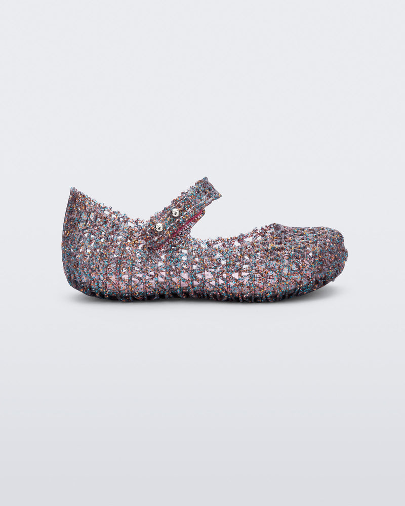 Side view of a glitter clear/pink Campana baby flat