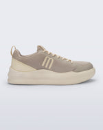 Side view of a beige X Mood sneaker