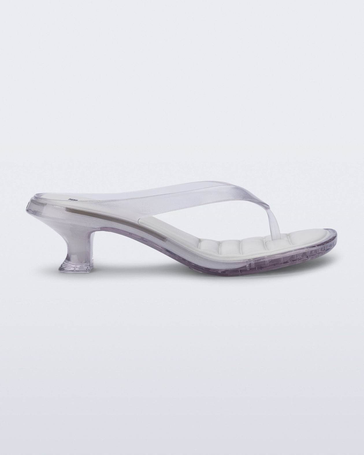 Side view of a clear Flip Flop Kitten Heel with  white insole