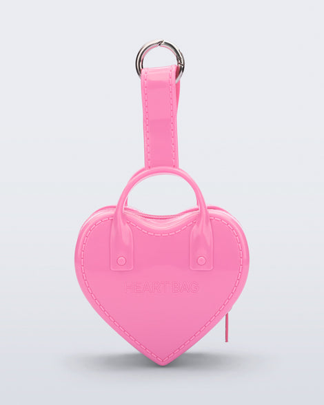 back view of a pink Heartbeat Pocket bag charm