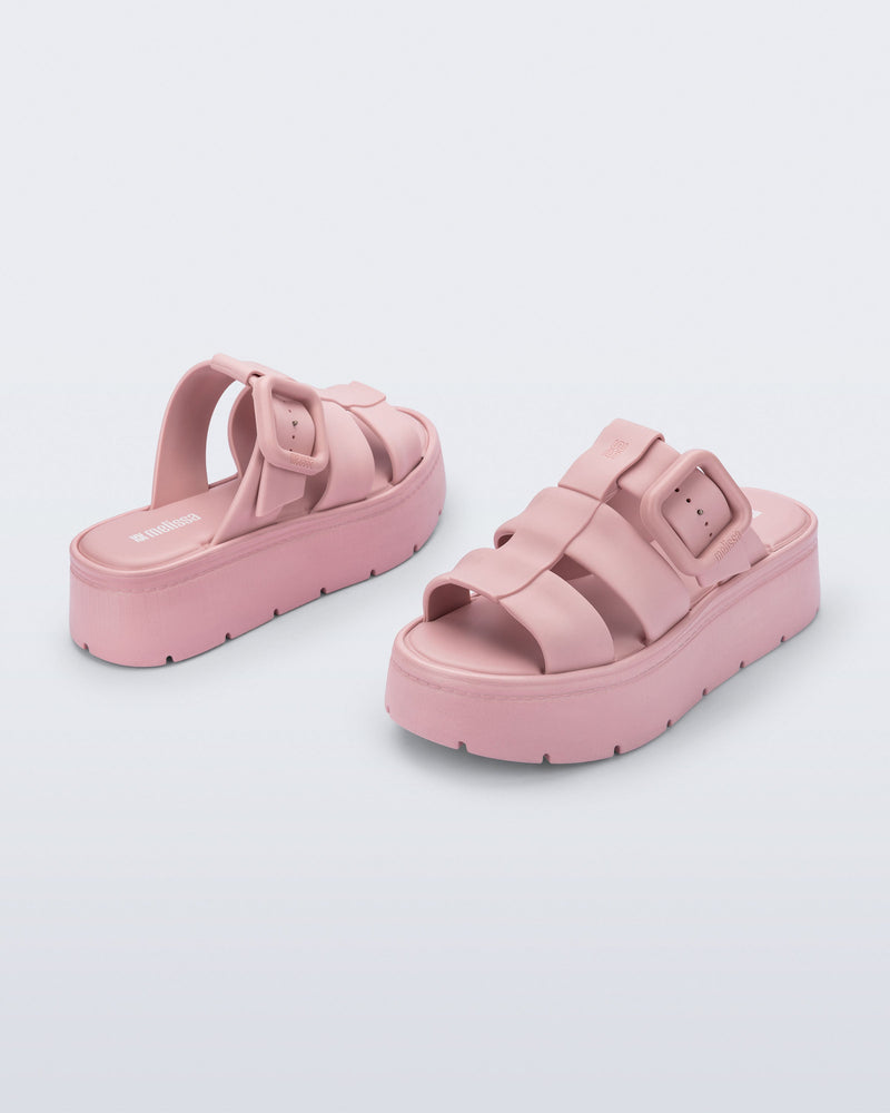 Back and angled view of a pair of pink Pump Platform sandals