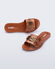 Top and angled view of a pair of brown Babe M Chic slide sandals
