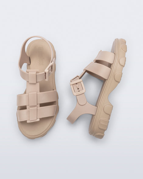Top and side view of a pair of beige Ella sandals