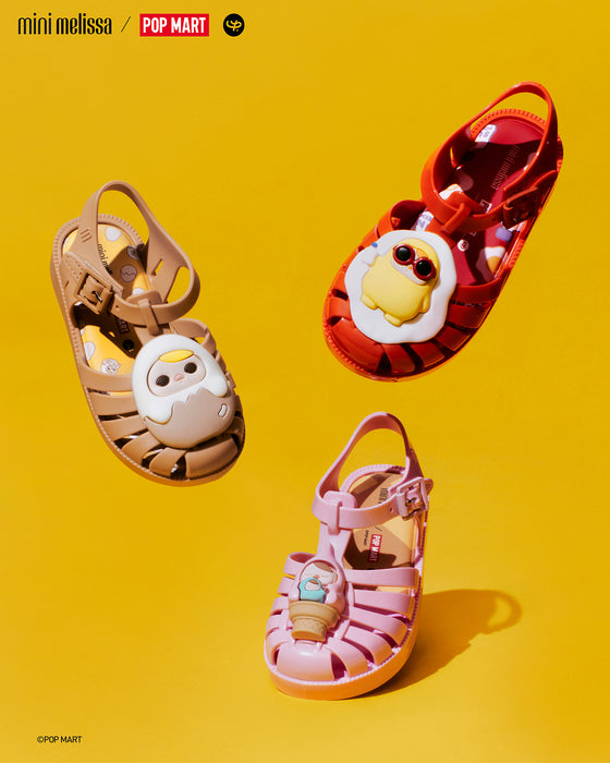 Melissa Possession + POP MART PUCKY in brown red and pink with PUCKY in different character representations: egg ice cream, and egg yolk