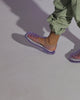 Video with no sound of a child model wearing a pair of clear Possession kids fisherman sandals.