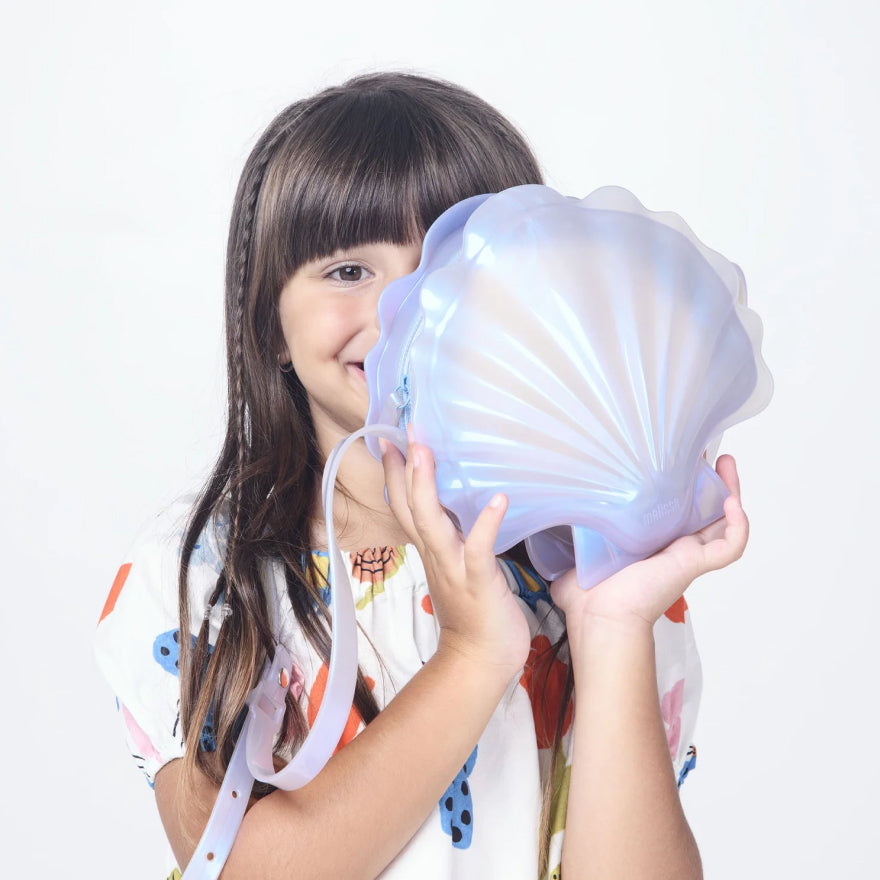 Kid model holding the shell bag