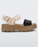 Side view of a Beige/Black Melissa Kick Off Platform Sandals with a brown sole and two black and tan straps.