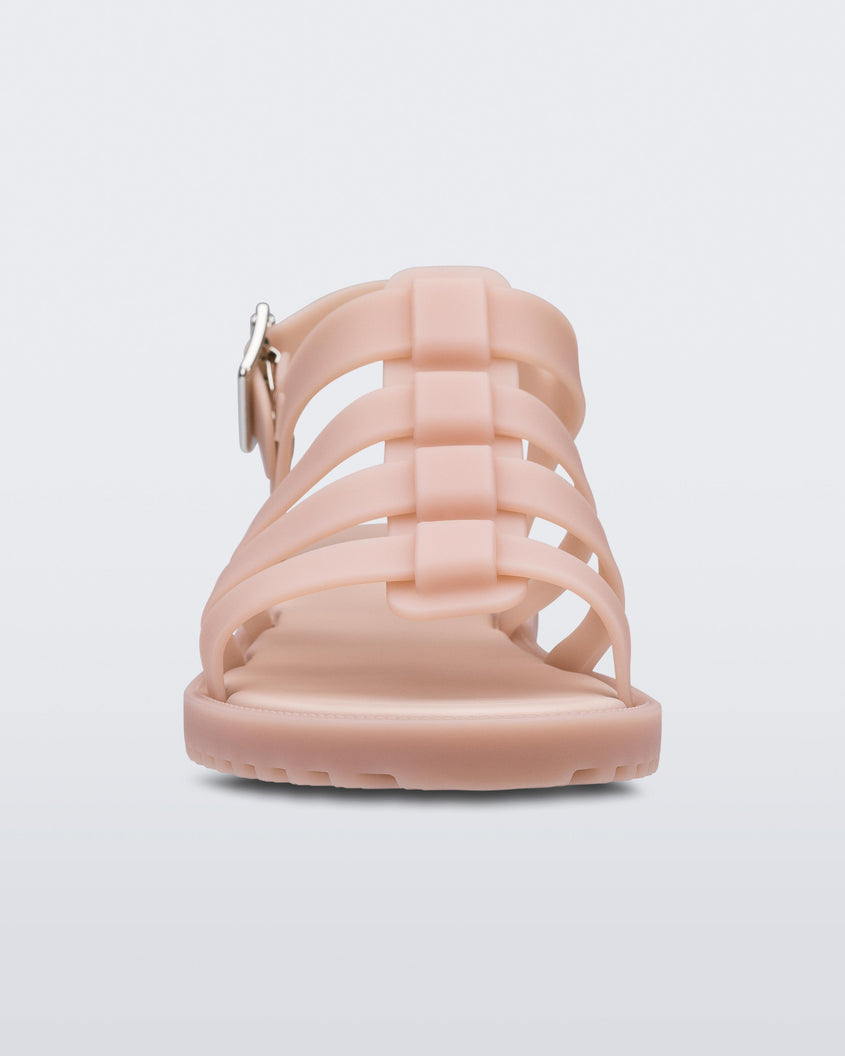 A front view of a pink Melissa Flox sandal with straps.