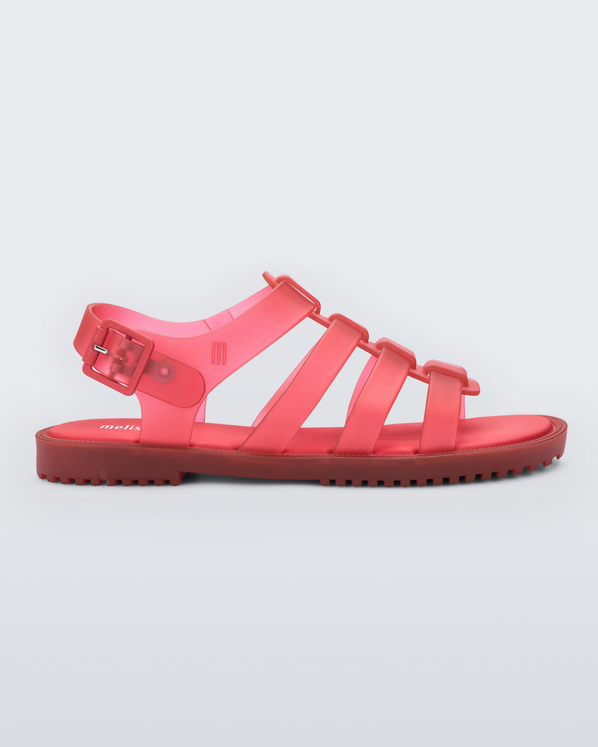 Side view of a red Melissa Flox sandal with straps.