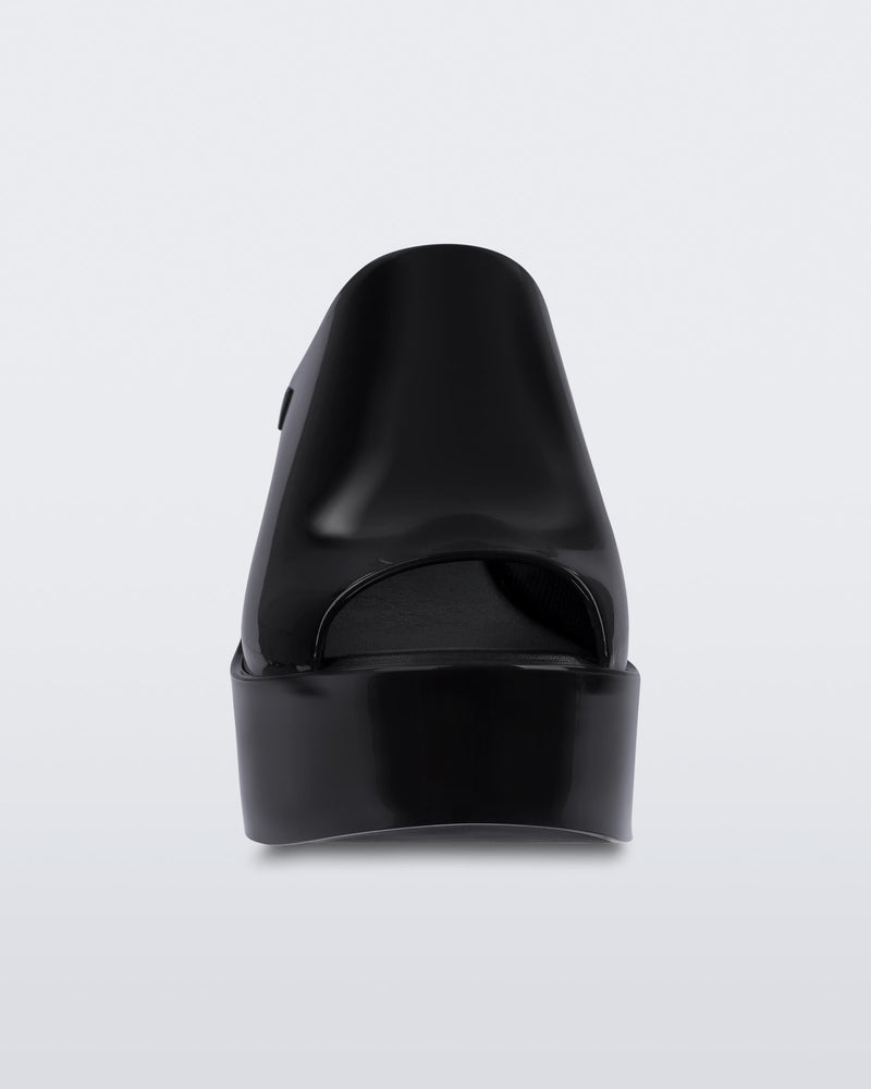 Front view of a black Melissa Mules platform heel.