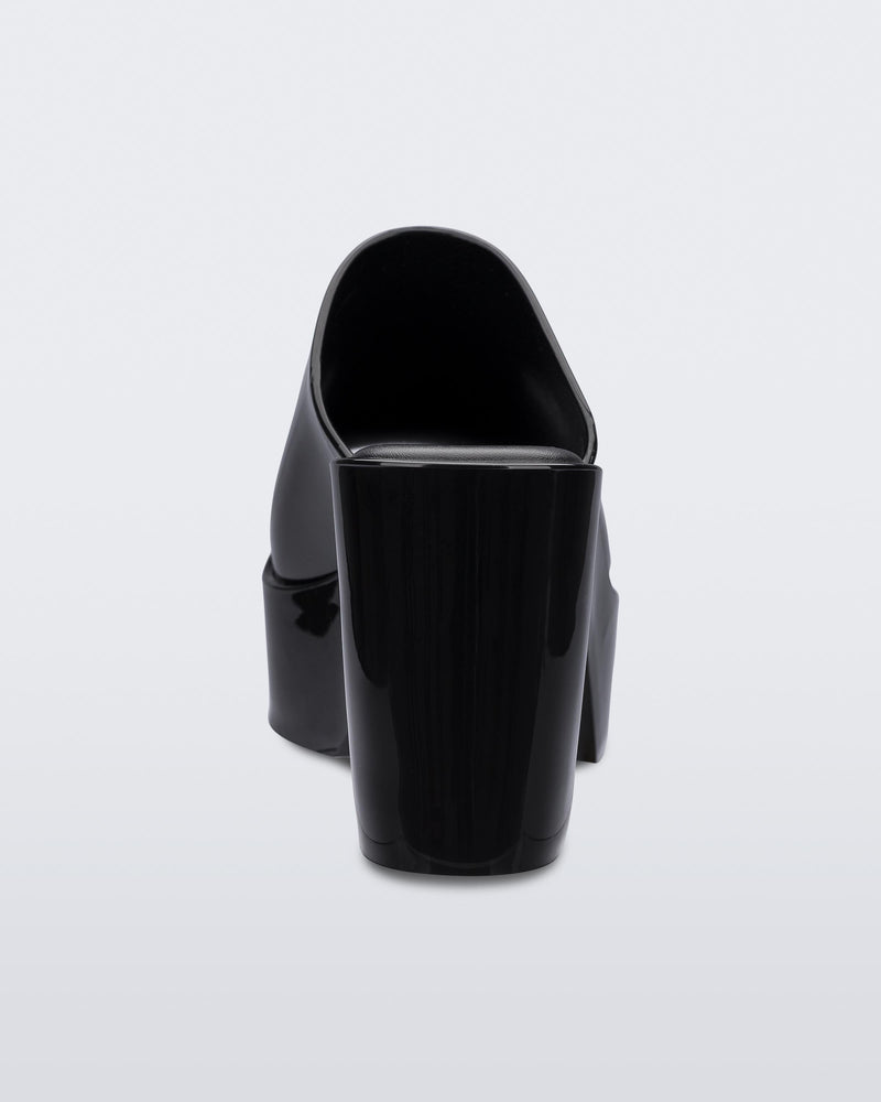 Back view of a black Melissa Mule platform heel.