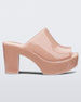 Side view of a pink Melissa Mule platform heel.