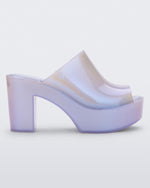 Side view of a pearly white Melissa Mule platform heel.