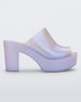 Side view of a pearly white Melissa Mule platform heel.