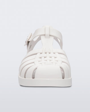 Front view of a white Melissa Possession sandal with several straps and a closed toe front.
