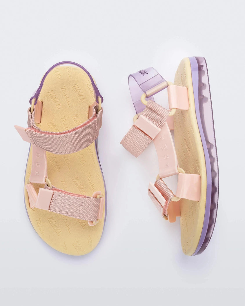 Top and side view of a pair of yellow insole Melissa Papete sandals with pink and purple straps.