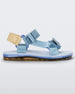 Side view of a blue Melissa Papete sandal with blue and beige straps.