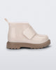 Side view of a beige/brown baby Chelsea boot