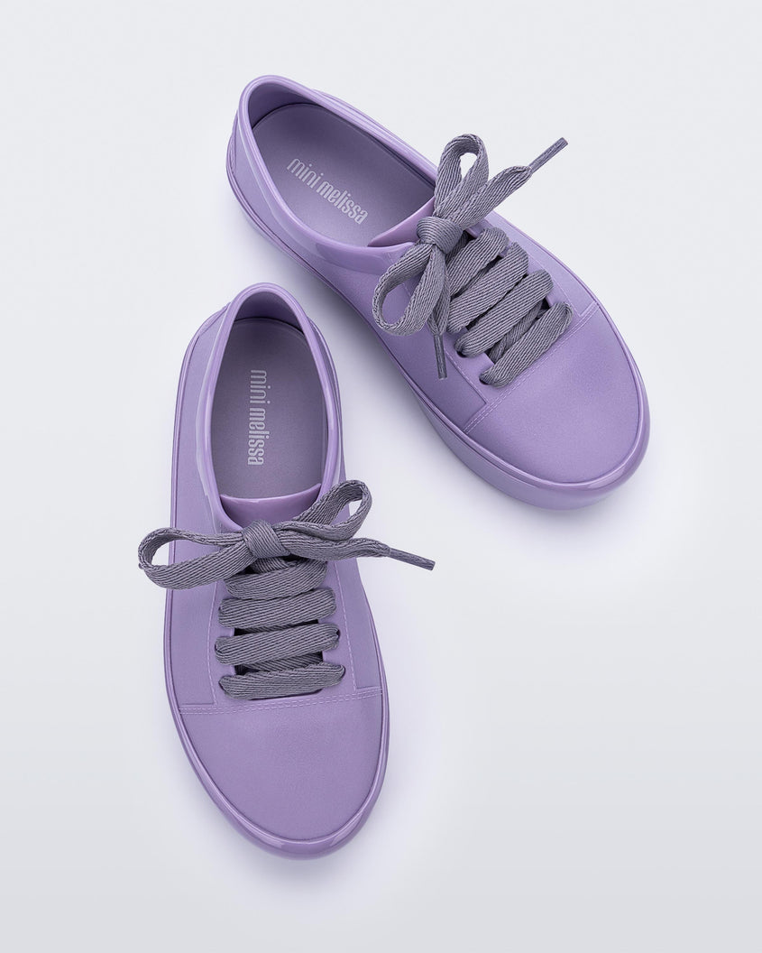 Top view of a pair of lilac Mini Melissa Street sneakers with a lilac base and laces.