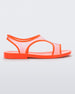Side view of a transparent orange Melissa Bikini Sandal with two transparent orange straps conjoining in the middle and an orange insole.