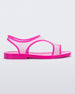 Side view of a transparent neon pink Melissa Bikini Sandal with two transparent pink straps conjoining in the middle and a pink insole.