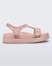 Side view of a transparent pink glitter Melissa Bikini Platform sandal with two transparent pink glitter straps conjoining in the middle and a pink sole.