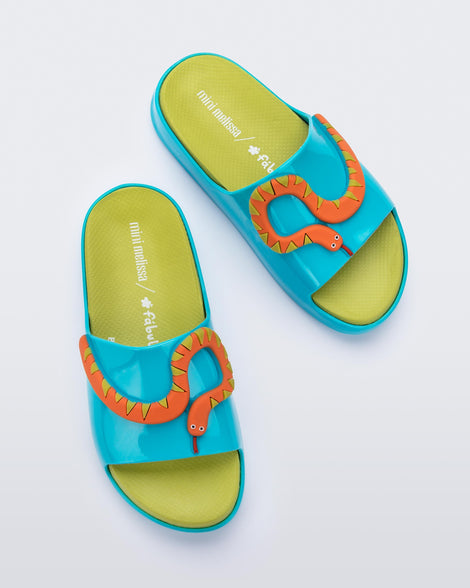 Top view of a pair of blue/green Cloud + Fábula kids slides