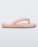 Side view of a light pink Melissa Free Flip Flop with puffer-like straps.