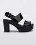 Side view of a black Melissa Mule heel platform sandal.