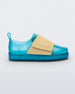 Side view of a pair of blue/yellow Mini Melissa Jelly Pop Sneakers with a blue base and a yellow velcro strap.