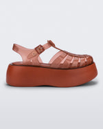 Side view of a brown Melissa Possession Platform sandal with several straps and a closed toe front.