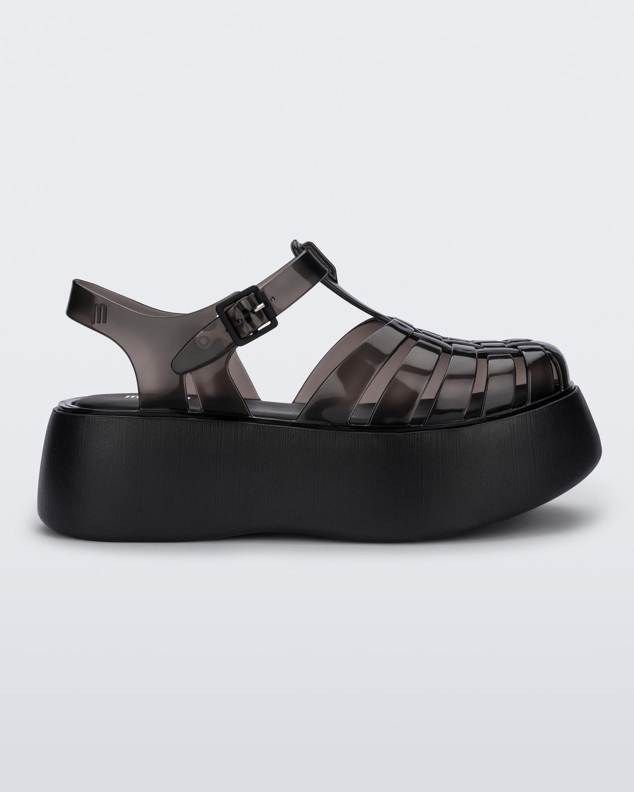 Side view of a black Melissa Possession Platform sandal with several straps and a closed toe front.