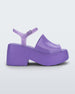 Side view of a lilac Melissa Pose platform sandal with a lilac front strap, a clear lilac ankle strap and a lilac sole.