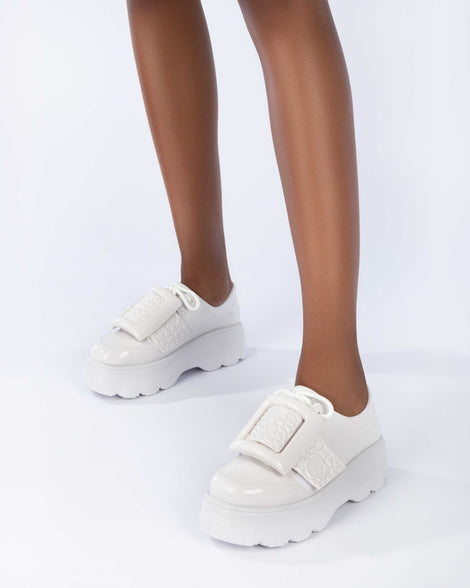 Buckle Up Kick Off Sneaker in White Melissa Shoes US