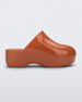 Side view of brown Melissa Bubble clog from the Simon Miller collaboration.