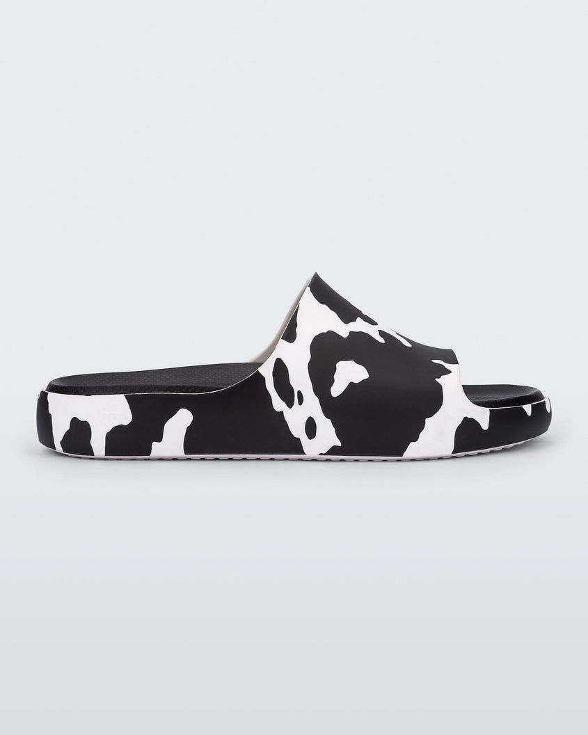 Cloud Slide in Black & White Cow – Melissa Shoes