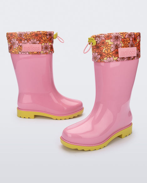 Side and angled view of a pair of pink Rain Boots kids