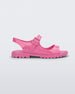 Side view of pink Melissa Bae sandals.