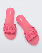 Top view of a pair of pink Melissa Jelly Chain slides with a pink chain detail.