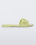 Side view of a green Melissa Jelly Chain slide with a green chain detail.