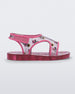 Side view of pink Mini Melissa Acqua sandal with Minnie Mouse print.
