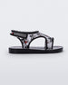 Side view of black Mini Melissa Acqua sandal with Mickey Mouse print.