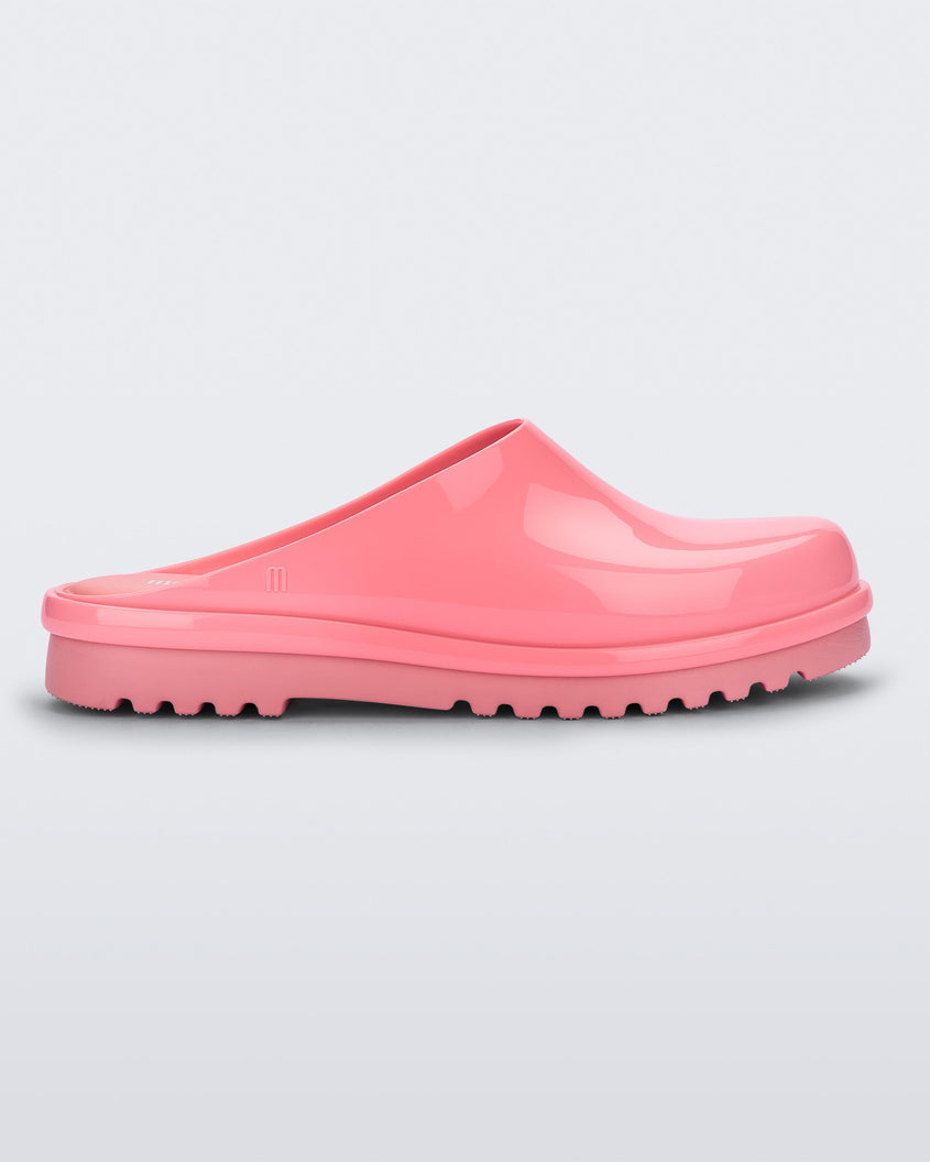 Side view of a pink Melissa Smart Clog.
