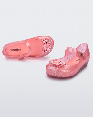 Product element, title Ultragirl Chrome Flower in Pink Clear Glitter
 price $39.00