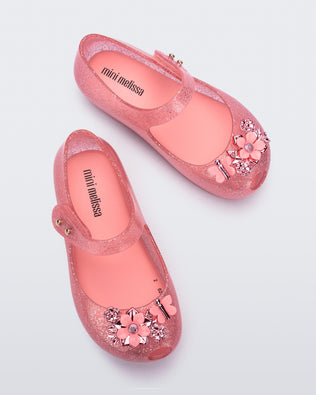 Product element, title Ultragirl Chrome Flower in Pink Clear Glitter
 price $39.00