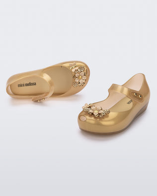 Product element, title Ultragirl Chrome Flower in Gold Pearl
 price $39.00